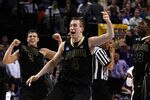 PORTLAND, OR - MARCH 21:  (C) Robbie Hummel #4 of the Purdue Boilermakers along with (L) Chris Kramer #3 and (R) E'Twaun Moore #33 celebrate after defeating the Washington Huskies during the second round of the NCAA Division I Men's Basketball Tournament at the Rose Garden on March 21, 2009 in Portland, Oregon. The Boilermakers defeated the Huskies 76-74 to advance to the Sweet 16.  (Photo by Jonathan Ferrey/Getty Images)