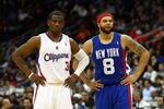NEWARK, NJ - MARCH 07:  (L-R) Chris Paul #3 of the Los Angeles Clippers and Deron Williams #8 of the New Jersey Nets look on during a stop in play at Prudential Center on March 7, 2012 in Newark, New Jersey. NOTE TO USER: User expressly acknowledges and agrees that, by downloading and or using this photograph, User is consenting to the terms and conditions of the Getty Images License Agreement.  (Photo by Chris Chambers/Getty Images)