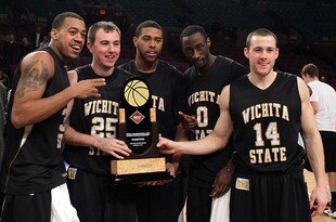NEW YORK, NY - MARCH 31:  Derek Brown #25,JT Durley #31, Graham Hatch #14, Aaron Ellis #0 and Gabe Blair #32 of the Wichita State Shockers celebrate with the trophy after defeating the Alabama Crimson Tide to win the 2011 NIT Championship game on March 31, 2011 at Madison Square Garden in New York City. Wichita State defeated Alabama 66-57.  (Photo by Jim McIsaac/Getty Images)