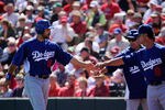 TEMPE, AZ - MARCH 12:  Andre Ethier #16 of the Los Angeles Dodgers is congratulated by manager Don Mattingly (R) after scoring a run in the first inning of a spring training baseball game against Los Angeles Angels of Anaheim at Tempe Diablo Stadium on March 12, 2012 in Tempe, Arizona.  (Photo by Kevork Djansezian/Getty Images)