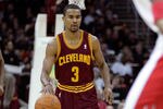 CLEVELAND, OH - DECEMBER 26:  Ramon Sessions #3 of the Cleveland Cavaliers brings the ball up court as Tristan Thompson #13 looks on against the Toronto Raptors during the season opener at Quicken Loans Arena on December 26, 2011 in Cleveland, Ohio. NOTE TO USER: User expressly acknowledges and agrees that, by downloading and or using this photograph, User is consenting to the terms and conditions of the Getty Images License Agreement.  (Photo by Mike Lawrie/Getty Images)