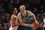 CHICAGO, IL - FEBRUARY 28:  Chris Kaman #35 of the New Orleans Hornets tries to move against Joakim Noah #13 of the Chicago Bulls at the United Center on February 28, 2012 in Chicago, Illinois. The Bulls defeated the Hornets 99-95. NOTE TO USER: User expressly acknowledges and agrees that, by downloading and or using this photograph, User is consenting to the terms and conditions of the Getty Images License Agreement.  (Photo by Jonathan Daniel/Getty Images)