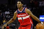 CHARLOTTE, NC - JANUARY 28:  Nick Young #1 of the Washington Wizards against the Charlotte Bobcats during their game at Time Warner Cable Arena on January 28, 2012 in Charlotte, North Carolina. NOTE TO USER: User expressly acknowledges and agrees that, by downloading and or using this photograph, User is consenting to the terms and conditions of the Getty Images License Agreement.  (Photo by Streeter Lecka/Getty Images)