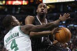 BOSTON, MA - JANUARY 17:   Gilbert Arenas #1 of the Orlando Magic heads for the basket as Nate Robinson #4 of the Boston Celtics defends on January 17, 2011 at the TD Garden in Boston, Massachusetts. The Celtics defeated the Magic 109-106.  NOTE TO USER: User expressly acknowledges and agrees that, by downloading and/or using this Photograph, User is consenting to the terms and conditions of the Getty Images License Agreement.  (Photo by Elsa/Getty Images)