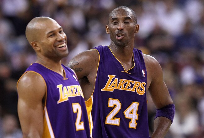 SACRAMENTO, CA - NOVEMBER 03:  Kobe Bryant #24 talks with Derek Fisher #2 of the Los Angeles Lakers during their game against the Sacramento Kings at ARCO Arena on November 3, 2010 in Sacramento, California.  NOTE TO USER: User expressly acknowledges and agrees that, by downloading and or using this photograph, User is consenting to the terms and conditions of the Getty Images License Agreement.  (Photo by Ezra Shaw/Getty Images)