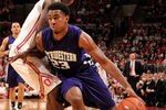 COLUMBUS, OH - DECEMBER 28:  JerShon Cobb #23 of the Northwestern Wildcats drives around Shannon Scott #3 of the Ohio State Buckeyes on December 28, 2011 at Value City Arena in Columbus, Ohio. Ohio State defeated Northwestern 87-54.   (Photo by Jamie Sabau/Getty Images)