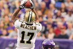 MINNEAPOLIS, MN - DECEMBER 18:    Robert Meachem #17 of the New Orleans Saints pulls in a pass while  Benny Sapp #22 of the Minnesota Vikings tries to get to him at the Hubert H. Humphrey Metrodome on December 18, 2011 in Minneapolis, Minnesota.  (Photo by Adam Bettcher /Getty Images)
