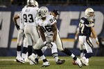 SAN DIEGO, CA - NOVEMBER 10:  Defensive lineman  Kamerion Wimbley #96 of the Oakland Raiders reacts after he sacks quarterback  Philip Rivers #17 of the San Diego Chargers in the first half at Qualcomm Stadium on November 10, 2011 in San Diego, California.  (Photo by Harry How/Getty Images)