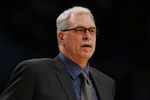 LOS ANGELES - FEBRUARY 13:  Head coach Phil Jackson of the Los Angeles Lakers looks on against the New York Knicks on February 13, 2007 at Staples Center in Los Angeles, California. The Knicks won 107-106.  NOTE TO USER: User expressly acknowledges and agrees that, by downloading and/or using this Photograph, user is consenting to the terms and conditions of the Getty Images License Agreement. (Photo by Lisa Blumenfeld/Getty Images)
