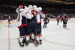 UNIONDALE, NY - MARCH 13: Alex Ovechkin #8 and the Washington Capitals celebrate a goal against the New York Islanders at the Nassau Veterans Memorial Coliseum on March 13, 2012 in Uniondale, New York. The Capitals defeated the Islanders 5-4 in the shootout.  (Photo by Bruce Bennett/Getty Images)