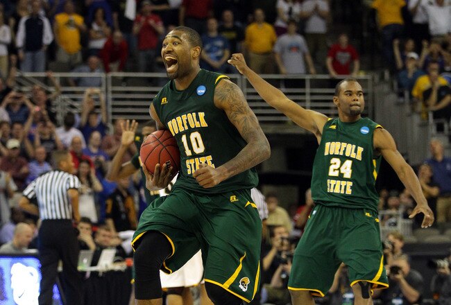 OMAHA, NE - MARCH 16:  Kyle O'Quinn #10 and Brandon Wheeless #24 of the Norfolk State Spartans celebrate after they won 86-84 against the Missouri Tigers during the second round of the 2012 NCAA Men's Basketball Tournament at CenturyLink Center on March 16, 2012 in Omaha, Nebraska.  (Photo by Doug Pensinger/Getty Images)