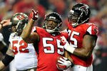 ATLANTA, GA - JANUARY 01:  John Abraham #55 and Jonathan Babineaux #95 of the Atlanta Falcons celebrate after Abraham's sack and fumble recovery against the Tampa Bay Buccaneers during play at the Georgia Dome on January 1, 2012 in Atlanta, Georgia.  (Photo by Grant Halverson/Getty Images)