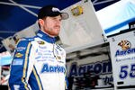 BRISTOL, TN - MARCH 16:  Brian Vickers, driver of the #55 Aaron's Dream Machine Toyota, looks on in the garage area during practice for the NASCAR Sprint Cup Series Food City 500 at Bristol Motor Speedway on March 16, 2012 in Bristol, Tennessee.  (Photo by Jared C. Tilton/Getty Images)