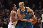 CHICAGO, IL - FEBRUARY 28:  Chris Kaman #35 of the New Orleans Hornets tries to move against Joakim Noah #13 of the Chicago Bulls at the United Center on February 28, 2012 in Chicago, Illinois. The Bulls defeated the Hornets 99-95. NOTE TO USER: User expressly acknowledges and agrees that, by downloading and or using this photograph, User is consenting to the terms and conditions of the Getty Images License Agreement.  (Photo by Jonathan Daniel/Getty Images)