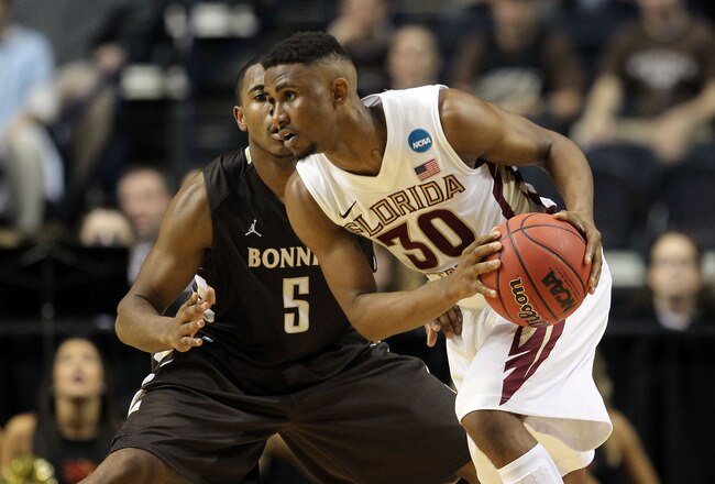 NASHVILLE, TN - MARCH 16:  Ian Miller #30 of the Florida State Seminoles drives past Jordan Gathers #5 of the St. Bonaventure Bonnies during the second round of the 2012 NCAA Men's Basketball Tournament at Bridgestone Arena on March 16, 2012 in Nashville, Tennessee.  (Photo by Jamie Squire/Getty Images)