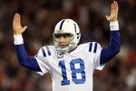 FOXBORO, MA - NOVEMBER 21:  Peyton Manning #18 of the Indianapolis Colts celebrates a touchdown in the fourth quarter against the New England Patriots on November 21, 2010 at Gillette Stadium in Foxboro, Massachusetts. The Patriots defeated the Colts 31-28. (Photo by Elsa/Getty Images)