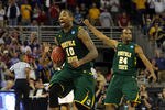 OMAHA, NE - MARCH 16:  Kyle O'Quinn #10 and Brandon Wheeless #24 of the Norfolk State Spartans celebrate after they won 86-84 against the Missouri Tigers during the second round of the 2012 NCAA Men's Basketball Tournament at CenturyLink Center on March 16, 2012 in Omaha, Nebraska.  (Photo by Doug Pensinger/Getty Images)