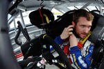 BRISTOL, TN - MARCH 17:  Brian Vickers, driver of the #55 Aaron's Dream Machine Toyota, sits in his car in the garage area during practice for the NASCAR Sprint Cup Series Food City 500 at Bristol Motor Speedway on March 17, 2012 in Bristol, Tennessee.  (Photo by Rainier Ehrhardt/Getty Images for NASCAR)