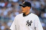 NEW YORK, NY - OCTOBER 02:  Freddy Garcia #36 of the New York Yankees walks off the field after being pulled in the sixth inning of Game Two of the American League Division Series against the Detroit Tigers at Yankee Stadium on October 2, 2011 in New York City.  (Photo by Chris Trotman/Getty Images)