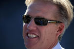 SAN DIEGO, CA - NOVEMBER 27:  Hall of Fame Quarterback John Elway of the Denver Broncos looks on from the field against the San Diego Chargers during their NFL Game on November 27, 2011 at Qualcomm Stadium in San Diego, California  (Photo by Donald Miralle/Getty Images)