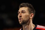 DENVER, CO - MARCH 21:  Andrea Bargnani #7 of the Toronto Raptors looks on during a break in the action against the Denver Nuggets at the Pepsi Center on March 21, 2011 in Denver, Colorado. The Nuggets defeated the Raptors 123-90. NOTE TO USER: User expressly acknowledges and agrees that, by downloading and or using this photograph, User is consenting to the terms and conditions of the Getty Images License Agreement.  (Photo by Doug Pensinger/Getty Images)