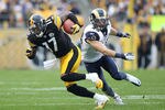PITTSBURGH, PA - DECEMBER 24:  Wide receiver Mike Wallace #17 of the Pittsburgh Steelers rushes past safety Craig Dahl #43 of the St. Louis Rams during the game at Heinz Field on December 24, 2011 in Pittsburgh, Pennsylvania.  (Photo by Karl Walter/Getty Images)