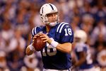 INDIANAPOLIS - DECEMBER 13:  Peyton Manning #18 of the Indianapolis Colts throws the ball during the NFL game against the Denver Broncos at Lucas Oil Stadium on December 13, 2009 in Indianapolis, Indiana.  (Photo by Andy Lyons/Getty Images)