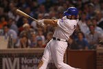 CHICAGO, IL - JUNE 29: Blake DeWitt #9 of the Chicago Cubs hits a run-scoring single in the 7th inning against the San Francisco Giants at Wrigley Field on June 29, 2011 in Chicago, Illinois.  The Cubs defeated the Giants 2-1. (Photo by Jonathan Daniel/Getty Images)