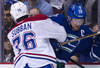 VANCOUVER, CANADA - MARCH 10: P.K. Subban #76 of the Montreal Canadiens delivers a bodycheck to Henrik Sedin #33 of the Vancouver Canucks during the first period in NHL action on March 10, 2012 at Rogers Arena in Vancouver, British Columbia, Canada.  (Photo by Rich Lam/Getty Images)