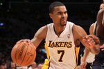 LOS ANGELES, CA - MARCH 18:  Ramon Sessions #7 of the Los Angeles Lakers drives against the Utah Jazz at Staples Center on March 18, 2012 in Los Angeles, California. The Jazz won 103-99.   NOTE TO USER: User expressly acknowledges and agrees that, by downloading and or using this photograph, User is consenting to the terms and conditions of the Getty Images License Agreement.  (Photo by Stephen Dunn/Getty Images)