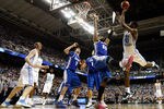 GREENSBORO, NC - MARCH 18:  Harrison Barnes #40 of the North Carolina Tar Heels shoots the ball over Gregory Echenique of the Creighton Blue Jays during the third round of the 2012 NCAA Men's Basketball Championship at Greensboro Coliseum on March 18, 2012 in Greensboro, North Carolina.  (Photo by Streeter Lecka/Getty Images)