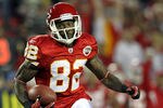KANSAS CITY, MO - OCTOBER 31:  Receiver Dwayne Bowe #82 of the Kansas City Chiefs carries the ball upfield after making a catch during the game against the San Diego Chargers on October 31, 2011 at Arrowhead Stadium in Kansas City, Missouri.  (Photo by Jamie Squire/Getty Images)