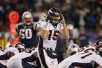 FOXBORO, MA - JANUARY 14:  Tim Tebow #15 of the Denver Broncos gestures as he stpes up to the line of scrimmage against the New England Patriots during their AFC Divisional Playoff Game at Gillette Stadium on January 14, 2012 in Foxboro, Massachusetts.  (Photo by Jim Rogash/Getty Images)