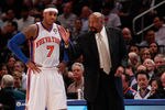 NEW YORK, NY - MARCH 14:  (R) Mike Woodson the interim head coach of the New York Knicks coaches (L) Carmelo Anthony #7 of the New York Knicks  during the game against the Portland Trailblazers at Madison Square Garden on March 14, 2012 in New York City. NOTE TO USER: User expressly acknowledges and agrees that, by downloading and/or using this Photograph, user is consenting to the terms and conditions of the Getty Images License Agreement.  (Photo by Chris Trotman/Getty Images)