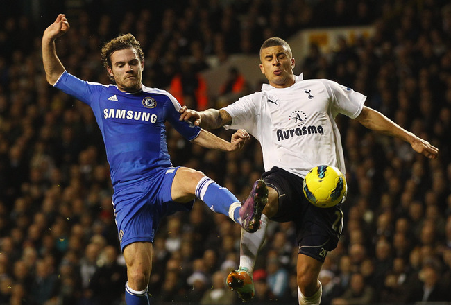 LONDON, ENGLAND - DECEMBER 22:  Juan Mata of Chelsea competes with Kyle Walker of Tottenham Hotspur during the Barclays Premier League match between Tottenham Hotspur and Chelsea at White Hart Lane on December 22, 2011 in London, England.  (Photo by Richard Heathcote/Getty Images)