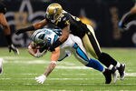 NEW ORLEANS, LA - JANUARY 1: Jeremy Shockey #80 of the Carolina Panthers is tackled by Ramon Humber #53 of the New Orleans Saints at the Mercedes-Benz Superdome on January 1, 2012 in New Orleans, Louisiana  (Photo by Scott Cunningham/Getty Images)
