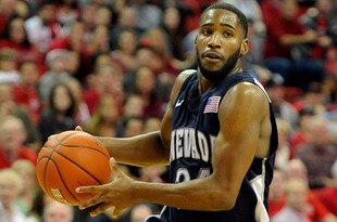LAS VEGAS, NV - NOVEMBER 14:  Deonte Burton #24 of the Nevada Reno Wolf Pack drives against the UNLV Rebels during their game at the Thomas & Mack Center November 14, 2011 in Las Vegas, Nevada. UNLV won 71-67.  (Photo by Ethan Miller/Getty Images)