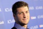 HOLLYWOOD, CA - FEBRUARY 13:  NFL Player Tim Tebow of the Denver Broncos arrives at the premiere of Relativity Media's 'Act Of Valor' held at ArcLight Cinemas on February 13, 2012 in Hollywood, California.  (Photo by Jason Merritt/Getty Images for Relativity Media)