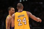 LOS ANGELES, CA - MARCH 16:  Ramon Sessions #7 and Kobe Bryant #24 of the Los Angeles Lakers consult on the court in the game against the Minnesota Timberwolves at Staples Center on March 16, 2012 in Los Angeles, California.  The Lakers won 97-92.  NOTE TO USER: User expressly acknowledges and agrees that, by downloading and or using this photograph, User is consenting to the terms and conditions of the Getty Images License Agreement.  (Photo by Stephen Dunn/Getty Images  (Photo by Stephen Dunn/Getty Images)