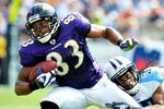 NASHVILLE, TN - SEPTEMBER 18:  Michael Griffin #33 of the Tennessee Titans tackles Lee Evans #83 of the Baltimore Ravens at LP Field on September 18, 2011 in Nashville, Tennessee. Tennessee won 26-13.  (Photo by Grant Halverson/Getty Images)
