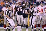 INDIANAPOLIS, IN - FEBRUARY 05:  Mark Anderson #95 of the New England Patriots reacts to a play in the fourth quarter against the New York Giants during Super Bowl XLVI at Lucas Oil Stadium on February 5, 2012 in Indianapolis, Indiana.  (Photo by Elsa/Getty Images)