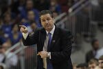 LOUISVILLE, KY - MARCH 17:  Head coach John Calipari of the Kentucky Wildcats gives instructions to his team against the Iowa State Cyclones during the third round of the 2012 NCAA Men's Basketball Tournament at KFC YUM! Center on March 15, 2012 in Louisville, Kentucky. Kentucky defeated Iowa State 87-71.  (Photo by Jonathan Daniel/Getty Images)