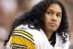 GLENDALE, AZ - OCTOBER 23:  Safety Troy Polamalu #43 of the Pittsburgh Steelers watches from the sidelines during the NFL game against the Arizona Cardinals at the University of Phoenix Stadium on October 23, 2011 in Glendale, Arizona. The Steelers defeated the Cardinals 32-20.  (Photo by Christian Petersen/Getty Images)