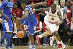 BLOOMINGTON, IN - DECEMBER 10:  Victor Oladipo #4 of the Indiana Hoosiers and Doron Lamb #20 of the Kentucky Wildcats battle for a loose ballduring the Indiana 73-72 victory at Assembly Hall on December 10, 2011 in Bloomington, Indiana.  (Photo by Andy Lyons/Getty Images)