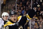 BOSTON, MA - DECEMBER 13:  Rich Peverley #49 of the Boston Bruins celebrates his goal in the first period against the Los Angeles Kings on December 13, 2011 at TD Garden in Boston, Massachusetts.  (Photo by Elsa/Getty Images)
