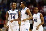 ATLANTA, GA - MARCH 23:  Michael Kidd-Gilchrist #14, Darius Miller #1 and Doron Lamb #20 of the Kentucky Wildcats react during their 102 to 90 win over the Indiana Hoosiers during the 2012 NCAA Men's Basketball South Regional Semifinal game at the Georgia Dome on March 23, 2012 in Atlanta, Georgia.  (Photo by Streeter Lecka/Getty Images)