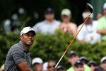 ORLANDO, FL - MARCH 24:  Tiger Woods plays a shot on the 9th hole during the third round of the Arnold Palmer Invitational presented by MasterCard at the Bay Hill Club and Lodge on March 24, 2012 in Orlando, Florida.  (Photo by Sam Greenwood/Getty Images)