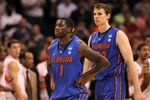 PHOENIX, AZ - MARCH 24:  Kenny Boynton #1 and Erik Murphy #33 of the Florida Gators react late in the second half against the Louisville Cardinals during the 2012 NCAA Men's Basketball West Regional Final at US Airways Center on March 24, 2012 in Phoenix, Arizona.  (Photo by Jamie Squire/Getty Images)