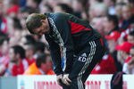 LIVERPOOL, ENGLAND - MARCH 24: Kenny Dalglish of Liverpool shows his frustrations during the Barclays Premier League match between Liverpool and Wigan Athletic at Anfield on March 24, 2012 in Liverpool, England.  (Photo by Laurence Griffiths/Getty Images)