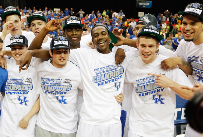 ATLANTA, GA - MARCH 25:  The Kentucky Wildcats celebrate defeating the Baylor Bears 82 to 70 during the 2012 NCAA Men's Basketball South Regional Final at the Georgia Dome on March 25, 2012 in Atlanta, Georgia.  (Photo by Streeter Lecka/Getty Images)